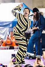 Harry Styles Accidentally Rips Jumpsuit on Stage During Concert Hollywood Life