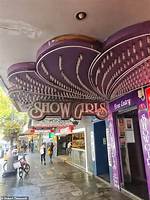 Uncover the Strip Clubs on 8 Mile: Unveiling Detroit's Enigmatic Nightlife